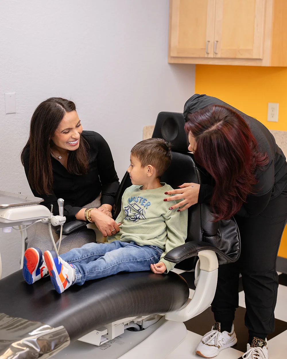 Dr. Iyer With Pediatric Dental Cleaning Patient