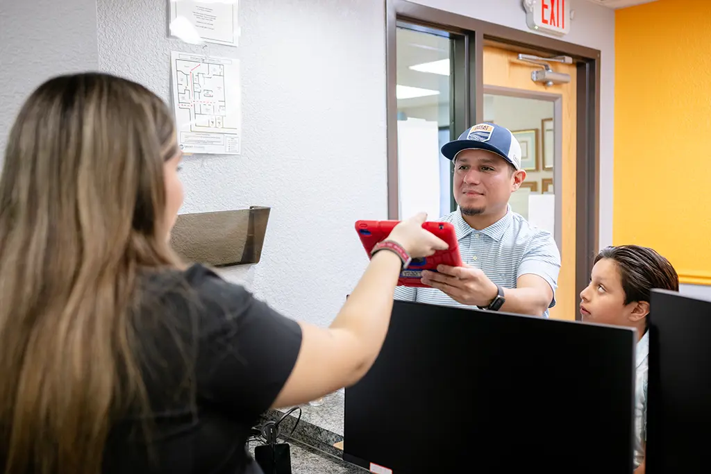Parent Paying For Clear Aligner Treatment